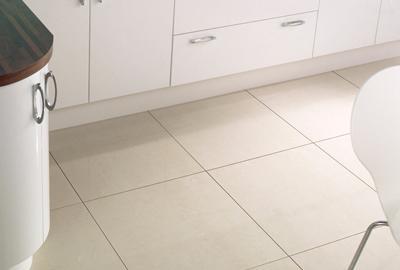 A kitchen floor with royale vanilla matt porcelain tiles 