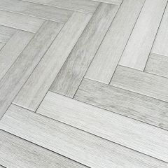 Herringbone Wood Effect Tiles_ close up. Trendy mini planks for hallways, kitchens, bathrooms and living areas.