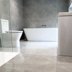 Mirage mirror polished extra large bathroom wall & floor tiles in a contemporary bathroom
