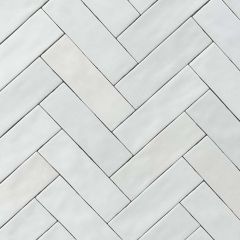 Monaco Pearl Satin Brick Wall Tiles. Laid in chevron style suitable for kitchens and bathrooms.