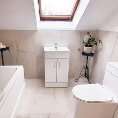 Onyx Ivory large bathroom tiles in a contemporary loft bathroom
