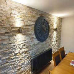 Oyster Split Face feature wall tiles in a dining room