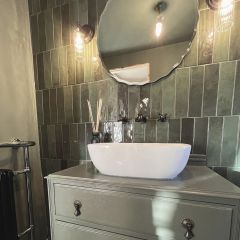 Paris forest brick wall tiles fitted vertical off-set_green vanity unit and wall lights