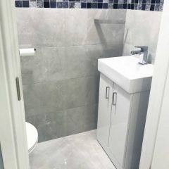 Pietra Light Grey 600x300mm Marble Effect Polished Porcelain Wall And Floor Tiles contemporary grey cloakroom