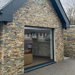 Rustic country multicolour split face - large cladding the exterior of a property