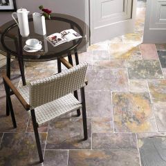 Sheera multicolour natural slate tiles modular set in an open plan dining area with chair and round glass table
