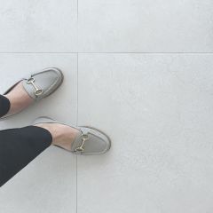 Valentiana 600x600mm porcelain floor and wall tiles_image showing shoes on tiles
