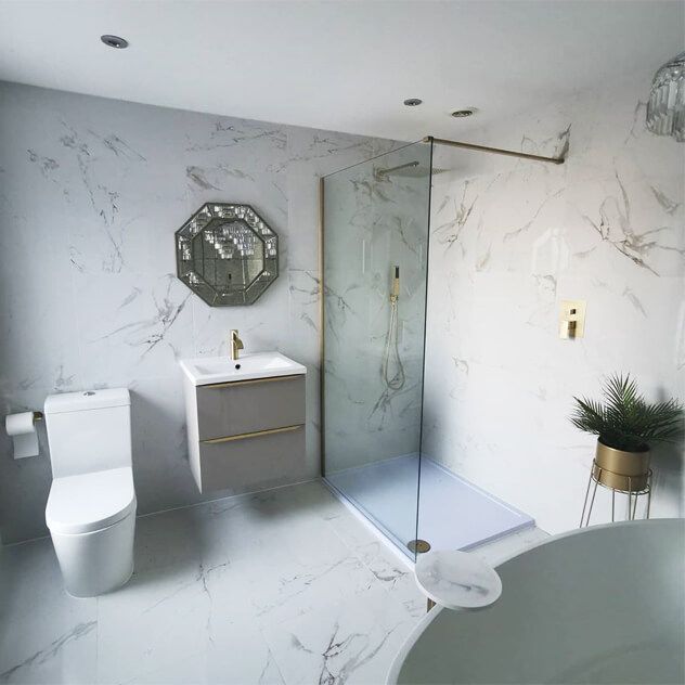 Carrara white porcelain tiles in a large bathroom space