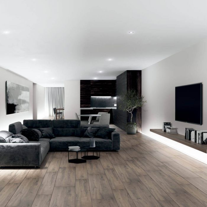 A modern living space with Baltic oak wood effect porcelain wall and floor tiles