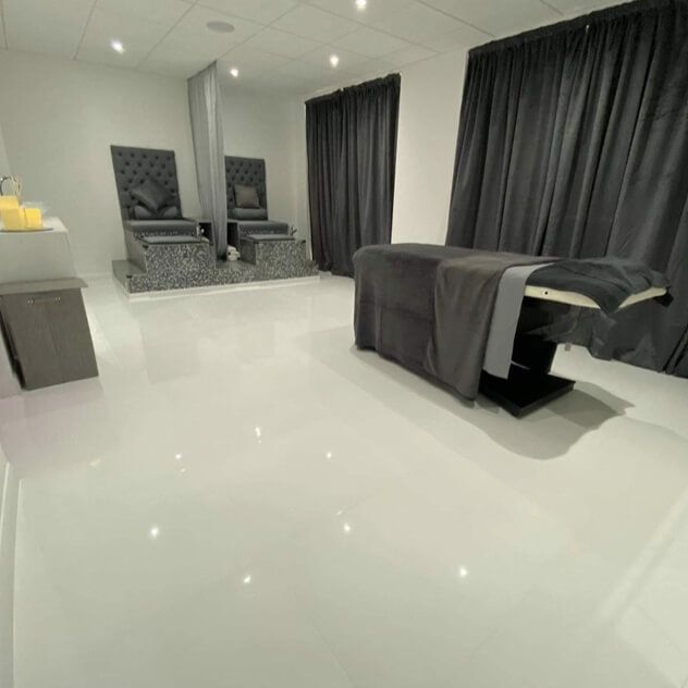 super white polished porcelain tiles in a beauty spa