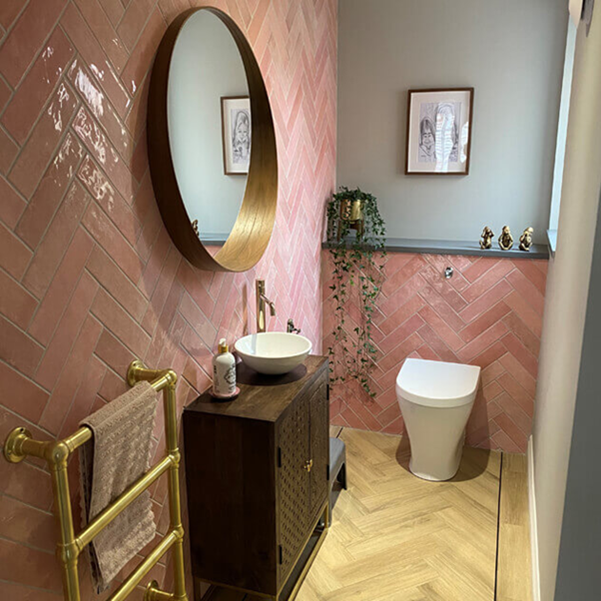 A cloakroom with Paris Rose brick wall tiles