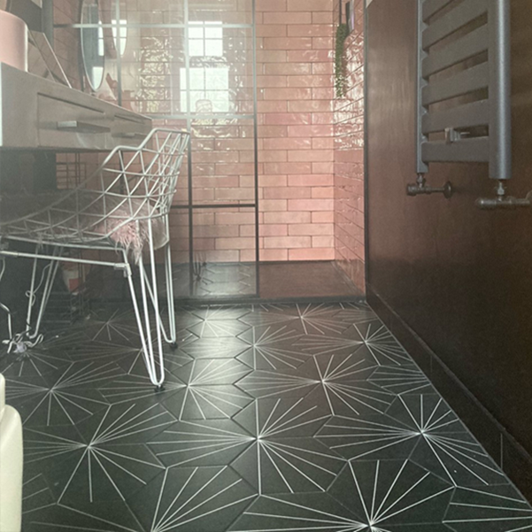 A bathroom with vector black hexagon tiles