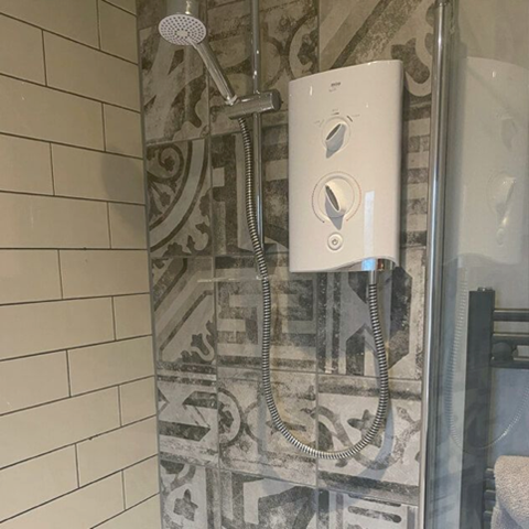 Ravello Grey Patterned Porcelain wall tiles in a shower space