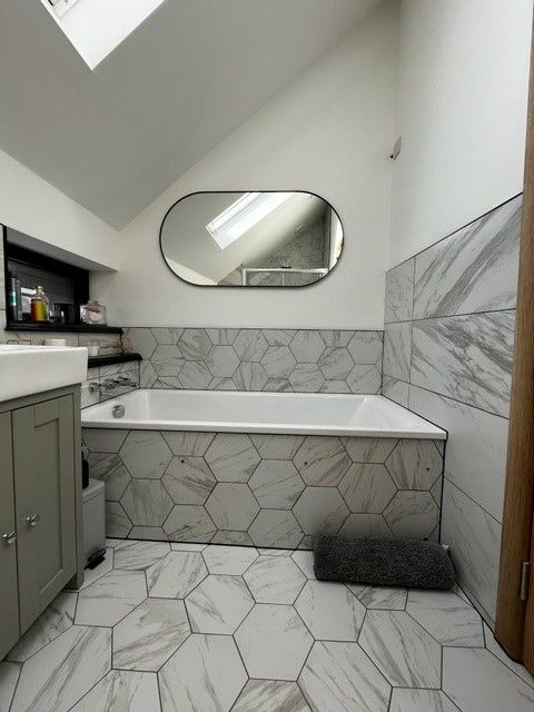 Carrara Satin hexagonal shaped tiles in a small bathroom
