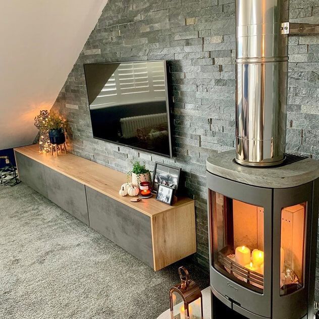 Silver Grey Split Face Mosaic Tiles in a living room setting around a fireplace 