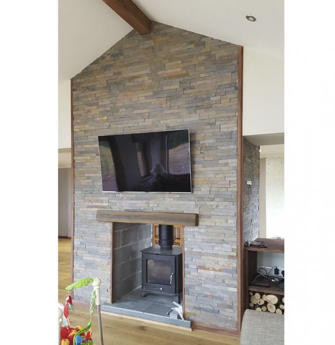 Sheera Multicolour Split Face mosaic tiles around a fireplace in a modern home 