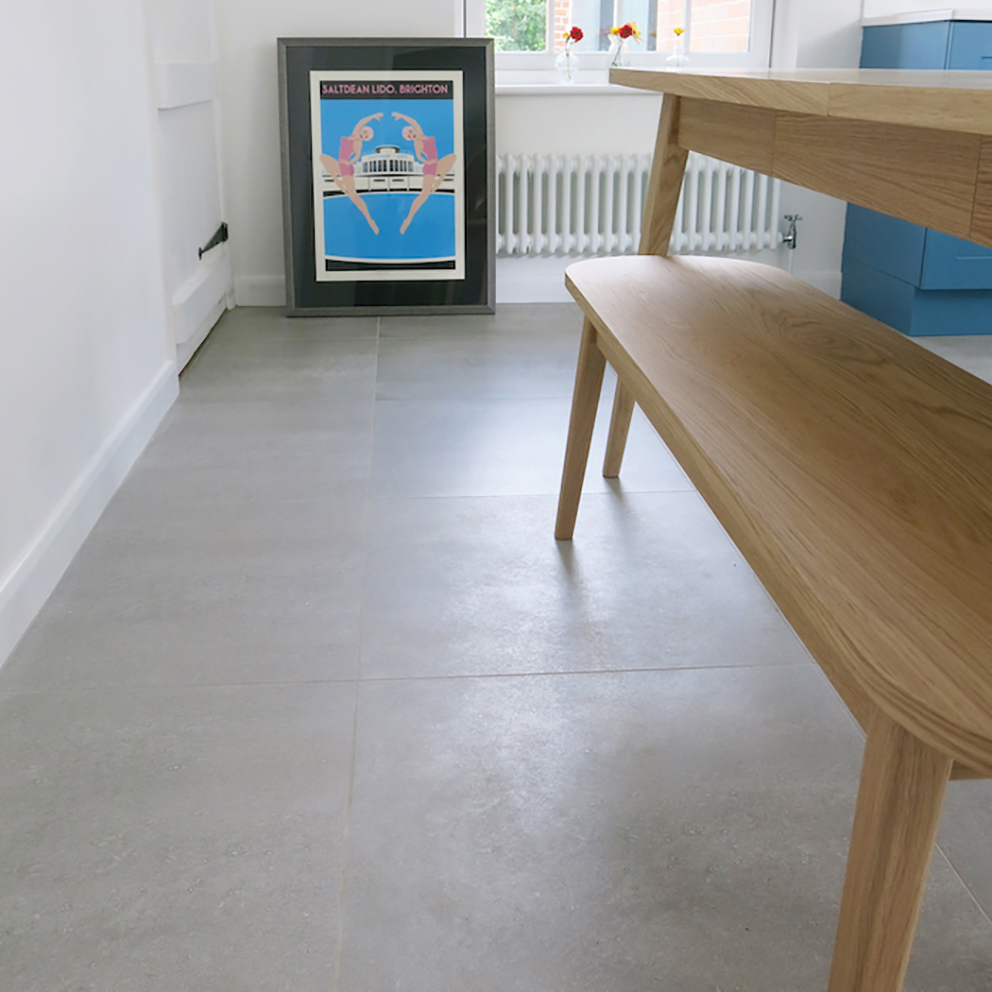 stone effect porcelain floor tiles helping to accentuate a modern vibe in a home